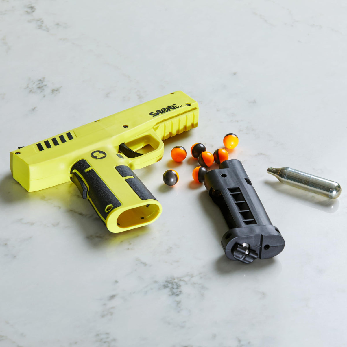 Sabre Home Defense Projectile Launcher, Large Size with (7) 0.68 Cal. Impact Projectiles, 40% More Stopping Power for Extra Home Protection, Holds Up to 7 Projectiles